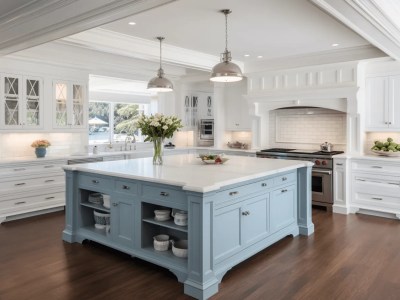 Beautiful, White Kitchen With Blue Island