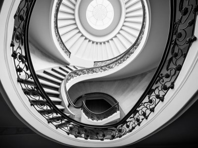 Black And White Image Of A Spiral Staircase