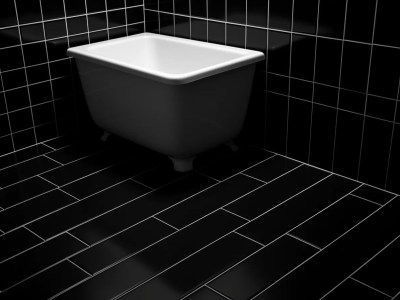 Black Tiled Bathroom With White Toilet And Towel Rack