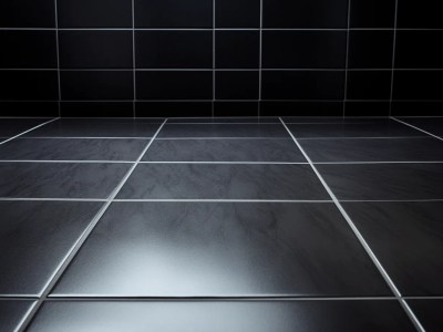 Black Tiles On A Square Floor In A Bathroom