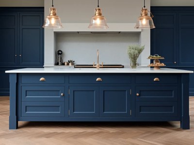 Blue Painted Kitchen With Two Brass Pendant Lighting Lamps