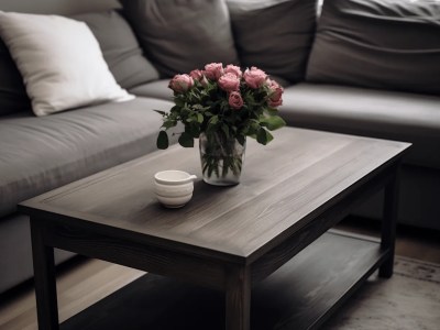 Coffee Table Has A Vase Of Flowers