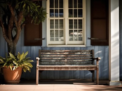 Front Porch Wooden Bench Near A Window