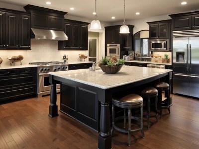 Kitchen That Has Black Cabinets And Hardwood Floors