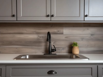 Kitchen With Dark Wood Cabinets With Sink And A Plant