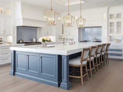 Large Kitchen  A Blue Color Kitchen Island Has White Granite And Silver Lighting