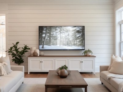 Simple Living Room Has A Tv And White Furniture