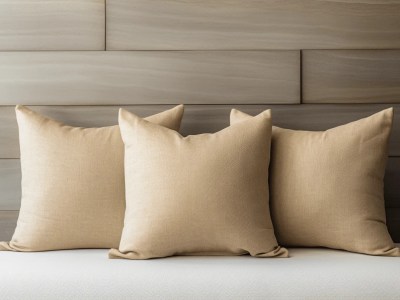 Soft Tan Linen Cushions Up Close On A Wooden Frame