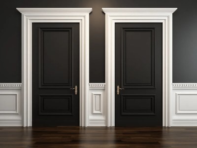 Two Double Doors In A Room With Black Cabinets And Wood Floors