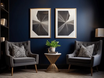 Two Framed Pictures With Blue Walls In A Room