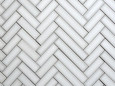 White Ceramic Tile In Herringbone Pattern