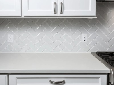 White Kitchen Backsplash With Herringbone Tile