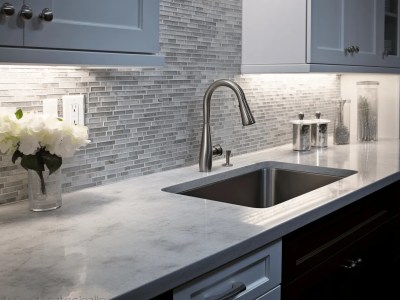 White Kitchen Has Glass Mosaic Tile In All Rooms