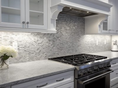 White Kitchen With A Gray Tile Backsplash