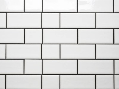 White Tile Wall On A Tile Floor