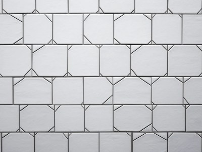 White Tile With White Patterns On It